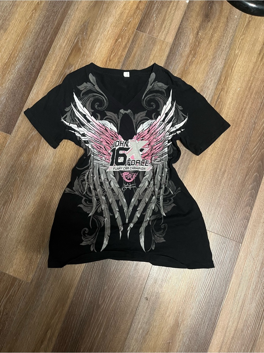 Black V-Neck Graphic Tee with Pink Wing Design